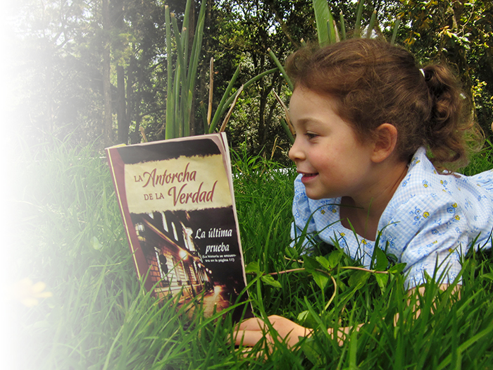 Niña leyendo libro